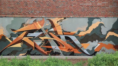 Brown and Grey Stylewriting by Tenk. This Graffiti is located in Lüneburg, Germany and was created in 2022.