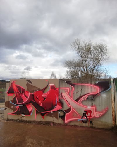 Red and Coralle and Brown Stylewriting by mtl, home 87 and Roweo. This Graffiti is located in Saalfeld (Saale), Germany and was created in 2023.