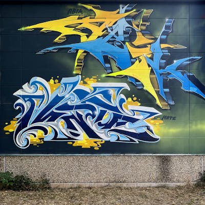 Yellow and Blue Stylewriting by Abik and Mate.one. This Graffiti is located in Hamburg, Germany and was created in 2022.