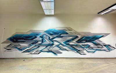 Grey and Cyan Stylewriting by SARE. This Graffiti is located in Austria and was created in 2023. This Graffiti can be described as Stylewriting, Abandoned and Futuristic.