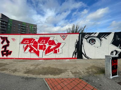 Red and White Stylewriting by Hyro and Tets. This Graffiti is located in Leeds, United Kingdom and was created in 2022. This Graffiti can be described as Stylewriting and Characters.