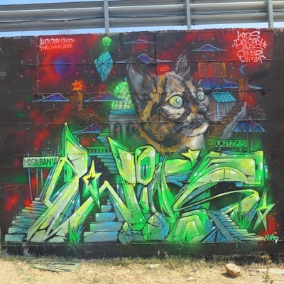 Light Green and Colorful Stylewriting by Wios. This Graffiti is located in Albania and was created in 2021. This Graffiti can be described as Stylewriting, Characters, Murals and Streetart.