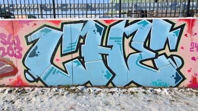 Light Blue and Coralle Stylewriting by CHE. This Graffiti is located in Geleen, Netherlands and was created in 2024.