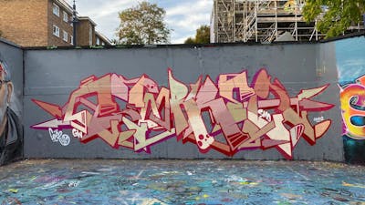 Coralle and Beige and Red Stylewriting by smo__crew and Core246. This Graffiti is located in London, United Kingdom and was created in 2022. This Graffiti can be described as Stylewriting and Wall of Fame.