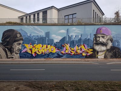 Colorful Stylewriting by Intro, Doe, REK and Snooper. This Graffiti is located in bochum, Germany and was created in 2021. This Graffiti can be described as Stylewriting, Characters, Murals and Wall of Fame.