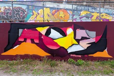 Colorful and Red Stylewriting by Toyz, OneTwo, Myb and Terazos. This Graffiti is located in Wien, Austria and was created in 2020. This Graffiti can be described as Stylewriting and Futuristic.