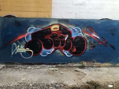 Red and Black and Light Blue Stylewriting by Aek. This Graffiti is located in Mexico and was created in 2023. This Graffiti can be described as Stylewriting and Throw Up.