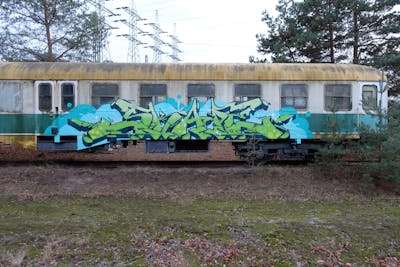 Light Green and Light Blue and Blue Stylewriting by S.KAPE289 and Skape289. This Graffiti was created in 2021 but its location is unknown. This Graffiti can be described as Stylewriting, Trains, Abandoned and Atmosphere.
