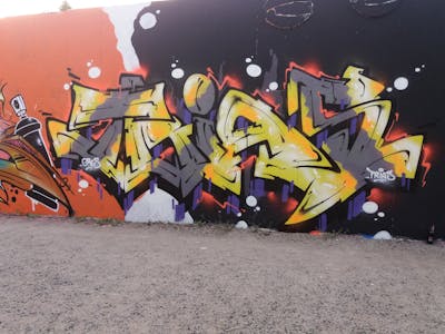Grey and Yellow Stylewriting by Trias. This Graffiti is located in Germany and was created in 2022. This Graffiti can be described as Stylewriting and Wall of Fame.