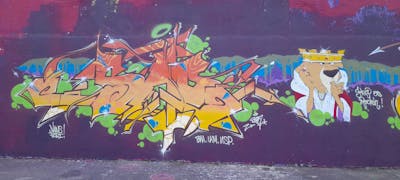 Orange and Colorful Stylewriting by SAO2971. This Graffiti is located in St helier, United Kingdom and was created in 2023. This Graffiti can be described as Stylewriting and Characters.