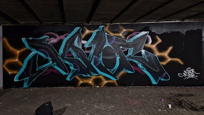 Black and Cyan Stylewriting by KNOR. This Graffiti is located in Baia Mare, Romania and was created in 2023.