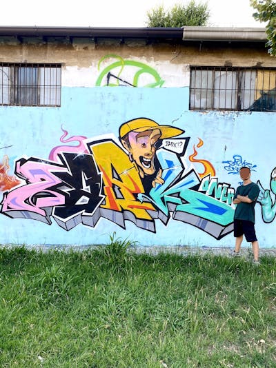 Colorful Stylewriting by ZARK ONER. This Graffiti is located in Milan, Italy and was created in 2021. This Graffiti can be described as Stylewriting and Characters.