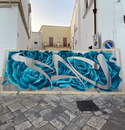 Cyan and Grey Characters by Paconer. This Graffiti is located in Italy and was created in 2023. This Graffiti can be described as Characters, Handstyles and Streetart.