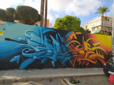 Light Blue and Orange Stylewriting by Rudi and Rudiart. This Graffiti was created in 2020 but its location is unknown. This Graffiti can be described as Stylewriting and 3D.