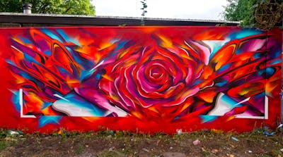 Red and Colorful Stylewriting by SNUZ. This Graffiti is located in Kopenhagen, Denmark and was created in 2021. This Graffiti can be described as Stylewriting, Characters and Futuristic.