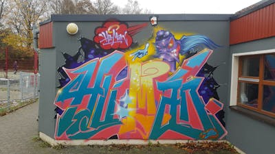Colorful and Cyan and Coralle Stylewriting by Hu-Man. This Graffiti is located in Hamburg, Germany and was created in 2023. This Graffiti can be described as Stylewriting and Characters.