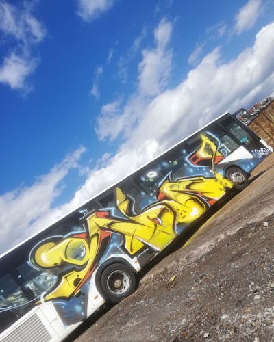 Orange and Yellow and Colorful Stylewriting by Roweo and mtl crew. This Graffiti is located in Saalfeld (Saale), Germany and was created in 2023. This Graffiti can be described as Stylewriting and Cars.