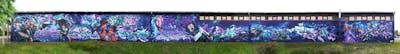 Violet and Cyan and Blue Murals by shmri, Posa, Chr15, joes, Sike2, Sirom, Searok, sade, AIDN, abyz, AZME, home 87, Marok, Rumsitzen Jam 2023 and FLOR. This Graffiti is located in Radebeul, Germany and was created in 2024. This Graffiti can be described as Murals, Stylewriting, Characters and Special.