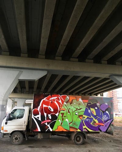 Colorful Stylewriting by Rames. This Graffiti is located in Saint-Petersburg, Russian Federation and was created in 2021. This Graffiti can be described as Stylewriting and Cars.