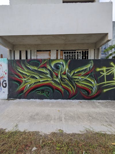 Light Green Stylewriting by Delik. This Graffiti is located in Playa del Carmen, Mexico and was created in 2023.