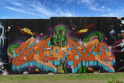 Green and Orange and Light Blue Stylewriting by Spocey. This Graffiti is located in Netherlands and was created in 2022. This Graffiti can be described as Stylewriting, Wall of Fame and Characters.