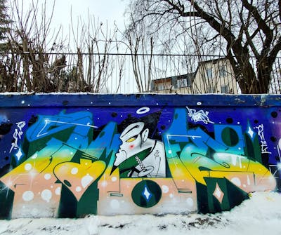 Blue and Yellow Stylewriting by Fems173. This Graffiti is located in Poland and was created in 2023. This Graffiti can be described as Stylewriting, Characters and Wall of Fame.