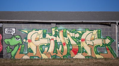 Brown and Light Green and Beige Stylewriting by Cime. This Graffiti is located in Budapest, Hungary and was created in 2022. This Graffiti can be described as Stylewriting, Characters and Wall of Fame.