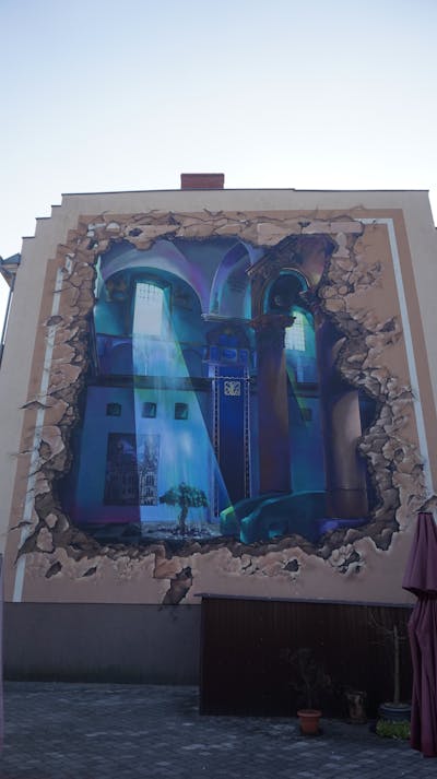 Brown and Blue and Light Blue Streetart by MozgeR. This Graffiti is located in Racibórz, Poland and was created in 2021. This Graffiti can be described as Streetart, Murals and 3D.