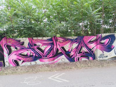 Coralle and Violet Stylewriting by Sainter. This Graffiti is located in Senec, Slovakia and was created in 2022. This Graffiti can be described as Stylewriting and 3D.