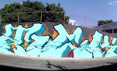 Cyan and Orange Stylewriting by Ckronologicko and tck crew. This Graffiti is located in Guadalajara, Mexico and was created in 2022.