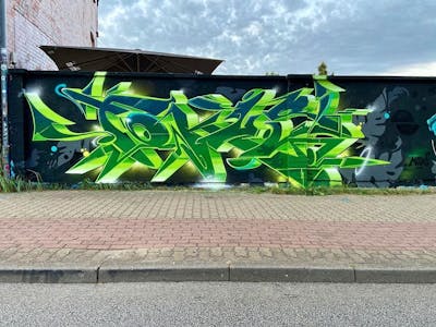 Light Green and Green Stylewriting by FOKUS.81. This Graffiti is located in Rostock, Germany and was created in 2020. This Graffiti can be described as Stylewriting.