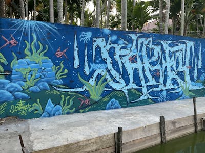 Blue and Light Green and Light Blue Stylewriting by M3C and Sakey. This Graffiti is located in Jambi City, Indonesia and was created in 2022. This Graffiti can be described as Stylewriting and Characters.