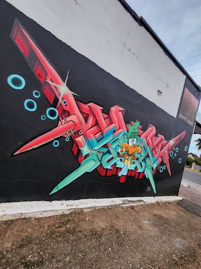 Cyan and Red Stylewriting by ADVRT. This Graffiti is located in Adelaide, Australia and was created in 2022. This Graffiti can be described as Stylewriting and Characters.