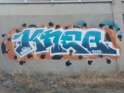 Colorful and White Stylewriting by KNEB. This Graffiti is located in Cyprus and was created in 2022. This Graffiti can be described as Stylewriting and Street Bombing.