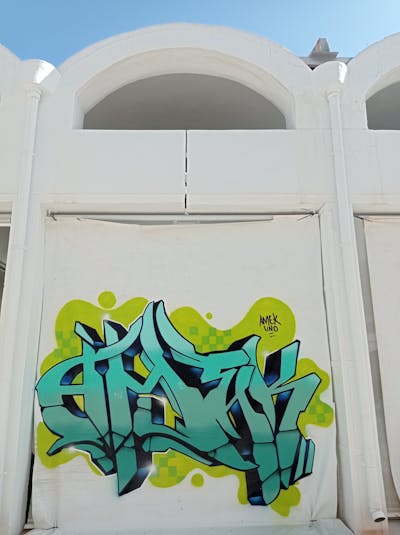 Cyan and Light Green Stylewriting by AMEK. This Graffiti is located in Alicante, Spain and was created in 2022.