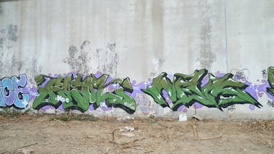 Green Stylewriting by Nevs and FASO. This Graffiti is located in Taipei, Taiwan and was created in 2023. This Graffiti can be described as Stylewriting and Abandoned.