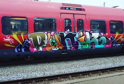 Colorful Stylewriting by Panik. This Graffiti is located in copenhagen, Denmark and was created in 2019. This Graffiti can be described as Stylewriting, Characters and Trains.