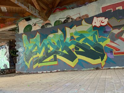 Light Green and Cyan Stylewriting by MOKE. This Graffiti is located in Berlin, Germany and was created in 2019. This Graffiti can be described as Stylewriting and Wall of Fame.