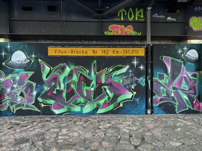 Light Green and Colorful and Violet Stylewriting by ZICK and PMZ CREW. This Graffiti is located in Meppen, Germany and was created in 2023. This Graffiti can be described as Stylewriting and Wall of Fame.