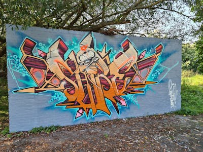 Orange and Light Blue Stylewriting by Shibe. This Graffiti is located in London, United Kingdom and was created in 2021. This Graffiti can be described as Stylewriting and Characters.