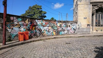 Colorful Street Bombing by unknown. This Graffiti is located in Rio de Janeiro, Brazil and was created in 2016. This Graffiti can be described as Street Bombing and Streetart.
