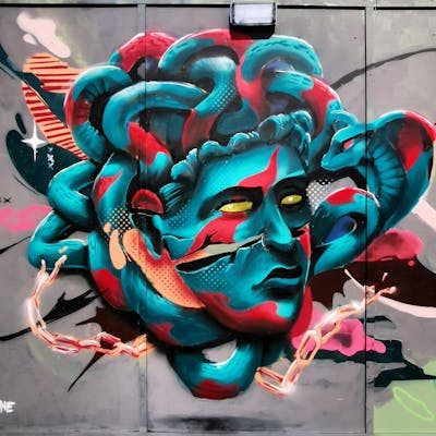 Red and Cyan Characters by REVES ONE. This Graffiti is located in London, Netherlands and was created in 2022. This Graffiti can be described as Characters and Wall of Fame.