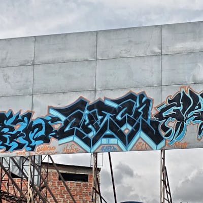Black and Light Blue Stylewriting by Check91_. This Graffiti is located in Comuna13, Colombia and was created in 2022. This Graffiti can be described as Stylewriting and Street Bombing.