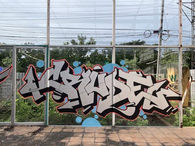 Chrome and Black Stylewriting by Crude. This Graffiti is located in Bangkok, Thailand and was created in 2020. This Graffiti can be described as Stylewriting and Abandoned.