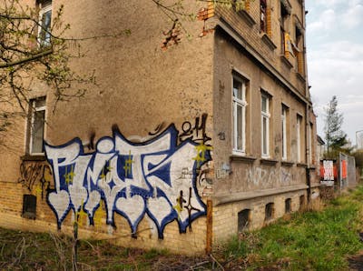 Chrome and Blue Stylewriting by Riots. This Graffiti is located in Leipzig, Germany and was created in 2011. This Graffiti can be described as Stylewriting and Street Bombing.
