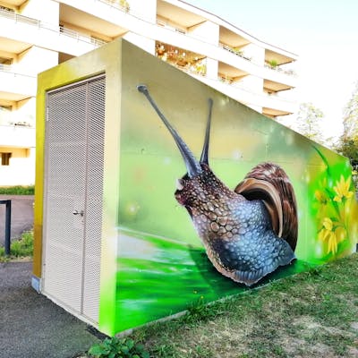 Light Green and Brown Characters by Atelier wandART. This Graffiti is located in Basel, Switzerland and was created in 2022. This Graffiti can be described as Characters and Commission.