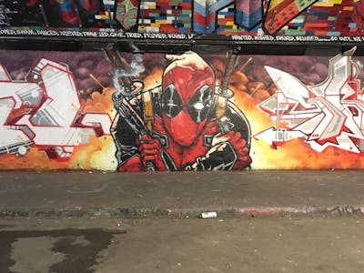 Red and Orange and Grey Characters by hertse1. This Graffiti is located in London, United Kingdom and was created in 2017. This Graffiti can be described as Characters and Wall of Fame.