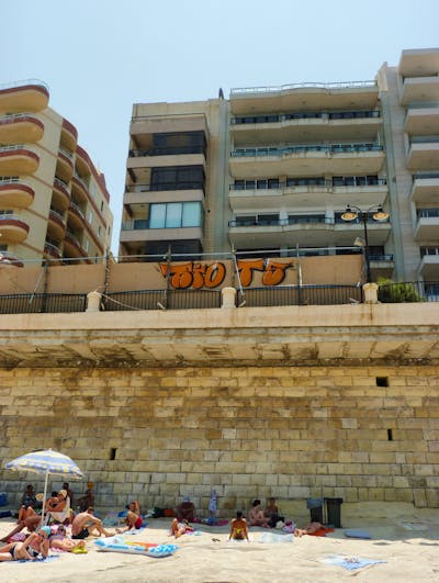 Orange Stylewriting by Riots. This Graffiti is located in Malta and was created in 2015. This Graffiti can be described as Stylewriting, Street Bombing, Atmosphere and Throw Up.