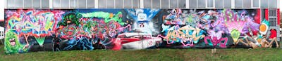 Colorful Stylewriting by Sike2, casom, shaz, spidercapsandco, ORES24, Watc, Deoner and Slem. This Graffiti is located in Hameln, Germany and was created in 2023. This Graffiti can be described as Stylewriting, Murals, Characters and Streetart.