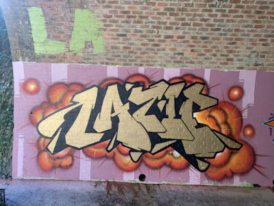 Gold Stylewriting by Lazie. This Graffiti is located in Sydney, Australia and was created in 2021. This Graffiti can be described as Stylewriting and Wall of Fame.